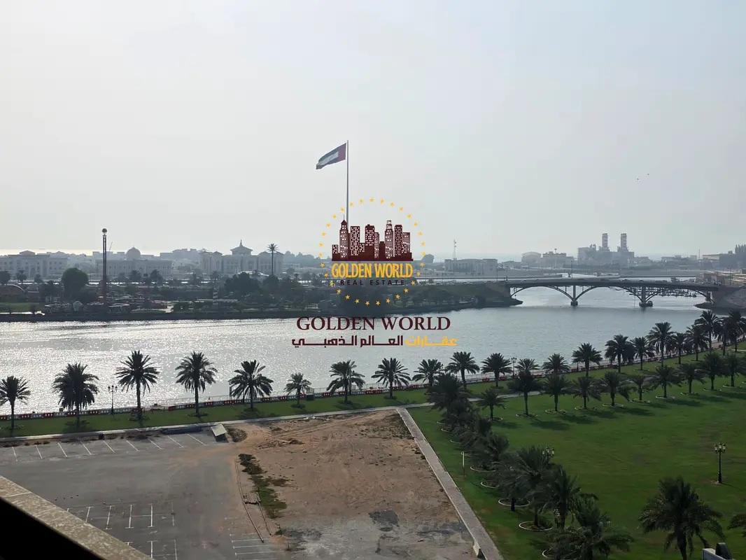 For annual rent in Al Majaz 1: 2 bedrooms, living room, balcony with sea view, 2 master bedrooms, b