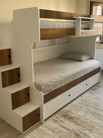 Solid wood finish bunk bed with storage stairs and trundle, excellent condition