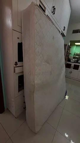 Used queen-size mattress - clean condition, some light stains
