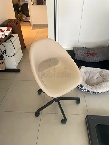 White modern swivel office chair on casters - good condition