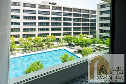 An exquisite, top-tier two-bedroom apartment with a living room in Aljada, featuring high-end (super-lux) finishing.