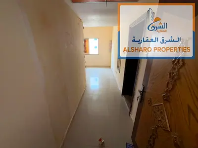 Studio apartment with balcony and open view, family building, central air conditioning, easy access to Sharjah and Dubai.