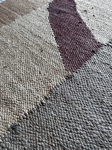 Neutral geometric woven rug — good condition
