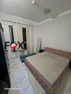 In one of Ajman's finest towers, Al Waha Tower | Luxury 2BR for annual rent in Ajman | Gym, pool & f