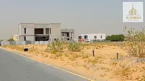 Land for sale in Rawdat Al Qurt area, 5166 sq ft, freehold, available to all Arab nationalities.
