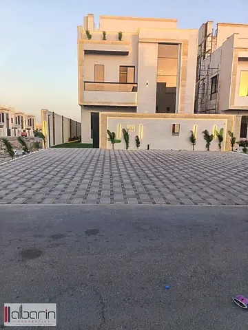 Villa for sale in Ajman, Al Zahia area: 5 master bedrooms and a majlis.