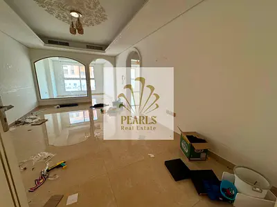 Annual rental in Al Mowaihat 3: luxurious 3BR apartment with majlis, 3 baths, balcony, central AC, gym & pool. 1 month free. AED 53K, 4–6 payments,