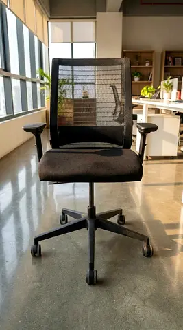 Used Steel Case black ergonomic mesh office chair with armrests and wheels