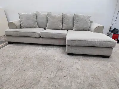 The one brand beige color lshape sofa for sale