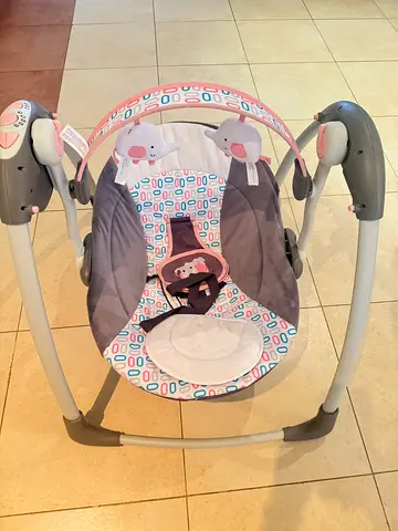 Baby bouncer/rocker seat with toy bar - gently used