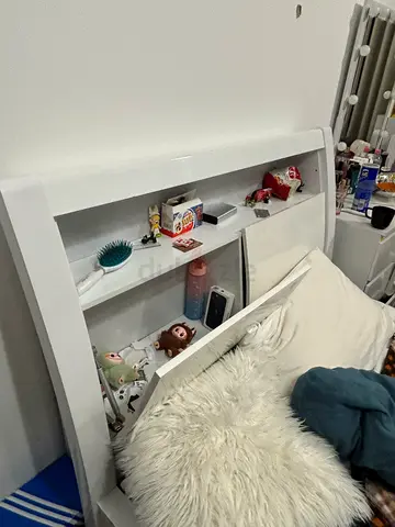 White wooden headboard with built-in shelves - good condition