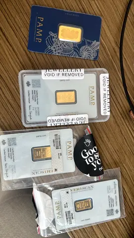 Collection of PAMP Suisse 24K Gold Bars