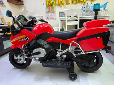 Red BMW-style Kids Electric Ride-on Motorcycle — Good Condition
