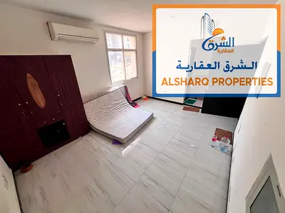 Ground floor studio for annual rent in Al Alia, Ajman, featuring a spacious layout, separate kitchen, and a bright interior in a prime location with