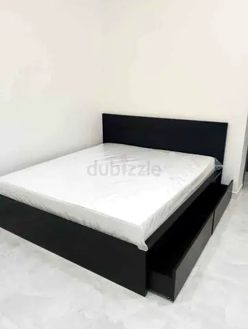 IKEA Malam king size bed 180/200cm with 2 storage drawers underneath and Ikea mattress is available