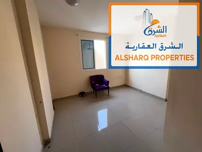 One-bedroom apartment for rent in Al Hamidiya, near the court and Ajman University. Features include a balcony, central air conditioning, and a living