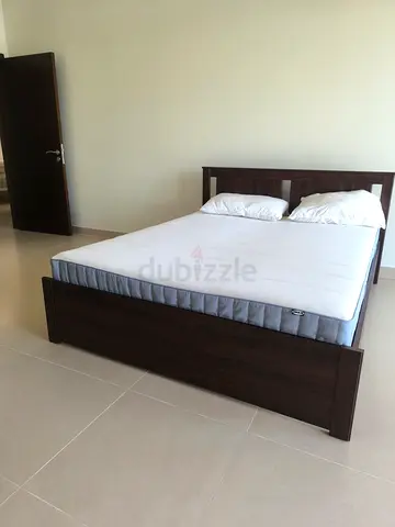 Ikea Dark Wood Queen size Bed Frame with Headboard and Ikea Mattress