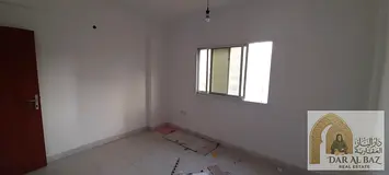 The largest one-bedroom and living room unit in Al-Qulai'ah, featuring a great price and a spacious