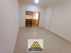 Apartment for annual rent in Ajman, Al Nuaimiya area. 2 bedrooms, living room, 2 bathrooms, built-in