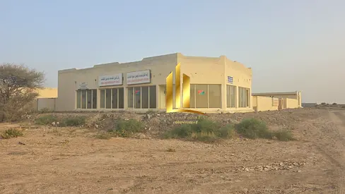 للبيع مبنى تجاري في مليحة – الشارقة