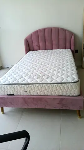 Single large pink velvet bed frame with mattress - good condition