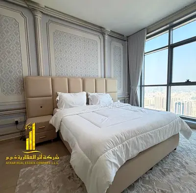 Luxury two-bedroom apartment with an open view in Ajman - Corniche - Residence Towers - furnished, available for monthly rent