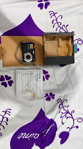 Compact digital camera with original box and manual