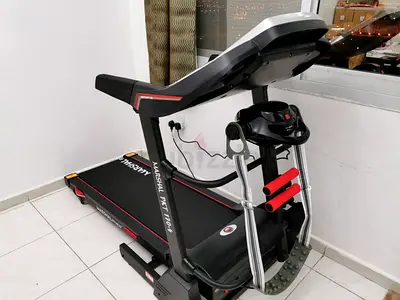 Folding Treadmill - Like New with dumbells and massager PRICE NEGOTIABLE