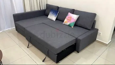 Grey L-shaped Sofa Bed with Storage — Good Condition