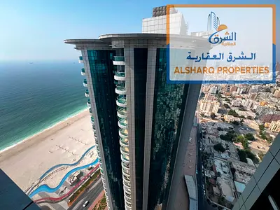 One-bedroom apartment with a living room, direct sea view, Ajman Corniche Towers, full amenities, gym, swimming pool, private parking.
