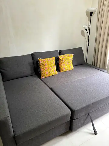 Grey L-shaped Sofa Bed - Good Condition
