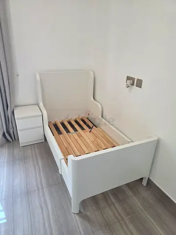 White Toddler Bed with Slatted Base and Nightstand