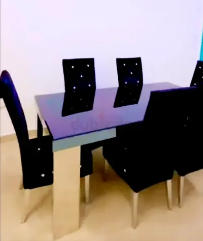 Modern 6-Seater Glass Top Dining Table with Black Chairs