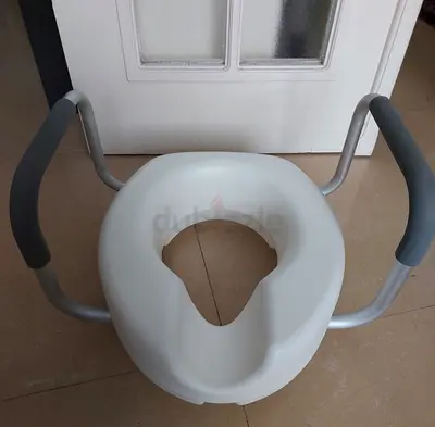 Raised Potty Seat with Armrests — Gently Used Toilet Trainer/Seat Riser