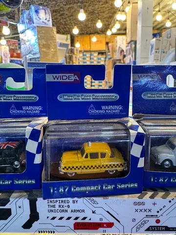 Set of Small Die-Cast Toy Cars in Original Blister Packs