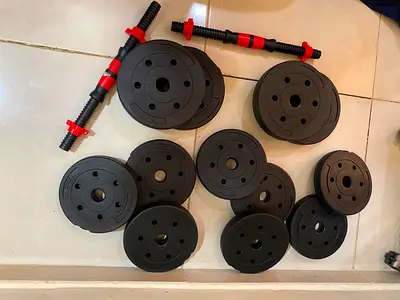 Adjustable dumbbell set with multiple weight plates (New)