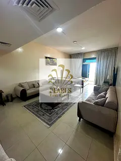 For Annual Rent in Al Huraizon Towers | Spacious and Elegant 2-Bedroom Apartment with Living Room | 