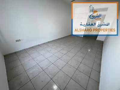 Spacious studio apartment with a semi-separate kitchen and central air conditioning for annual rent in Al Nuaimiya 2, Ajman. Easy access to Dubai and