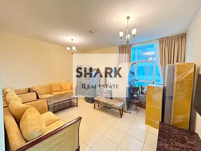 Largest two-bedroom apartment with a living room in Al Orient Towers, Ajman, Al Rashidiya 1. Includes two bathrooms, a balcony, and parking.