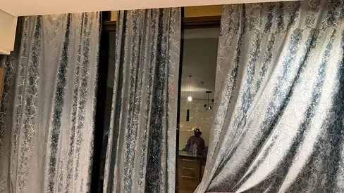 Set of light blue patterned curtains - good condition