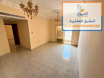 The apartment features two master bedrooms, a spacious living room, two bathrooms, built-in wardrobes, modern and contemporary finishes, and a central