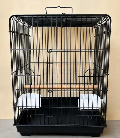 Medium metal bird cage with perches and feeder bowls