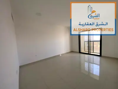 Brand new 1BR apartment in Al Jurf Industrial 2, balcony, open view, prime location.
