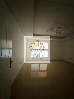 Annual rental in Al Mowaihat 3: spacious 2 master bedrooms and hall, second tenant, 3 baths, balcony