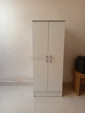Slim white wardrobe/storage cabinet - excellent condition/brand new. Just received an hour ago.