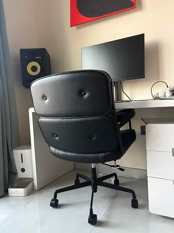 Black leather office chair with armrests - good condition