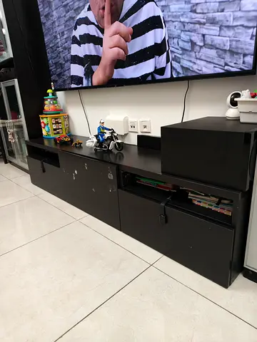 Black low TV entertainment unit with storage - good condition from Ikea