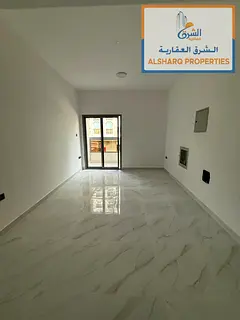First tenant in Al Karama area, near Ajman Corniche. Master bedroom - balcony with open view - at a