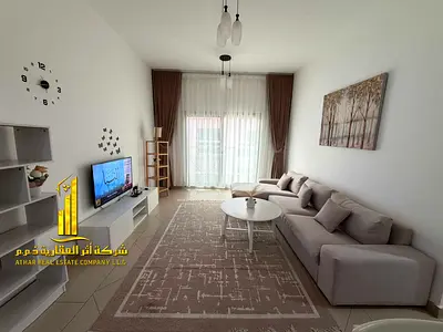 Luxury apartment, second occupancy, one bedroom and living room with a balcony and open view. Ajman, Al Shurooq Towers. for monthly rent.
