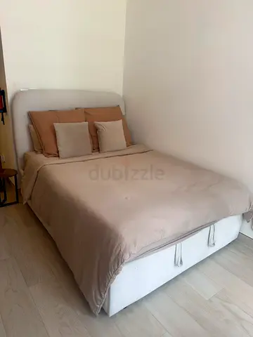 Double bed with storage base and mattress - neutral beige
